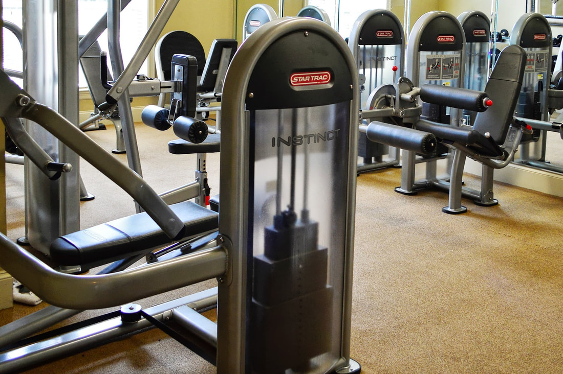 Image of a fitness center at Lafayette Gardens - apartments with a gym - lafayette la